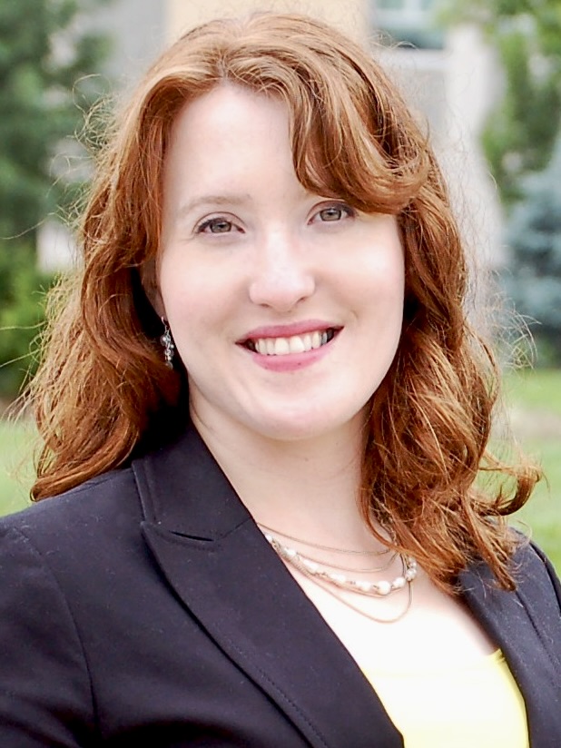 Picture of Amber Cheek, a woman with red hair.